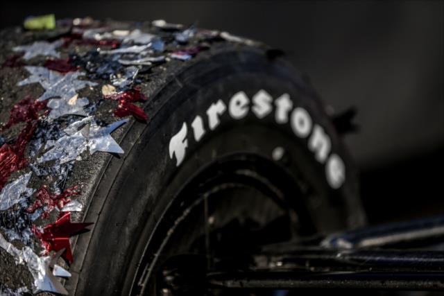 Confetti cover the tires of Scott Dixon's Chevrolet in Victory Lane following his victory in the GoPro Grand Prix of Sonoma -- Photo by: Shawn Gritzmacher