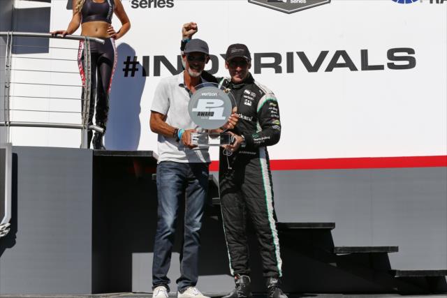 Simon Pagenaud accepts the Verizon P1 Award for winning the pole position for the GoPro Grand prix of Sonoma -- Photo by: Chris Jones