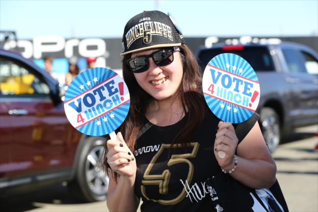 A fan shows her Dancing With The Stars support for James Hinchcliffe at Sonoma Raceway -- Photo by: Chris Jones