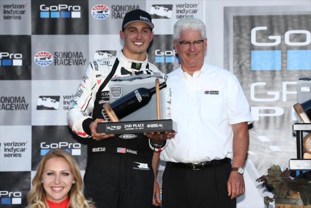 Graham Rahal accepts his 2nd Place trophy in Victory Lane following the GoPro Grand Prix of Sonoma -- Photo by: Chris Jones