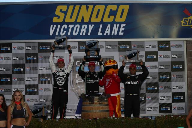 The podium of Simon Pagenaud, Graham Rahal, and Juan Pablo Montoya hoist their trophies in Victory Lane following the GoPro Grand Prix of Sonoma -- Photo by: Chris Jones