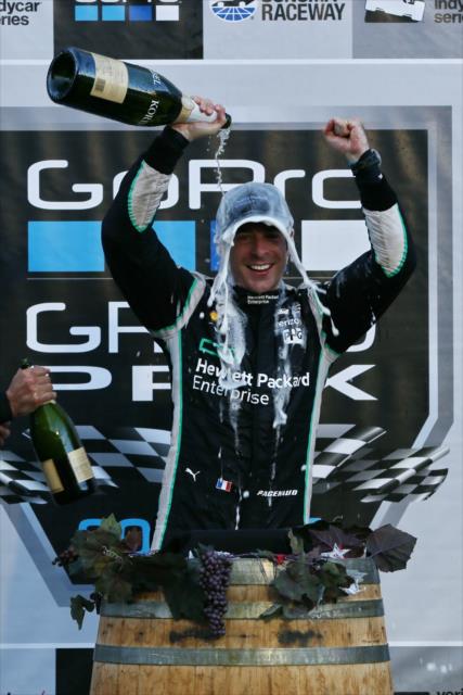Simon Pagenaud with a champagne shower in Victory Lane after winning the GoPro Grand Prix of Sonoma and the 2016 Verizon IndyCar Series Championship -- Photo by: Chris Jones