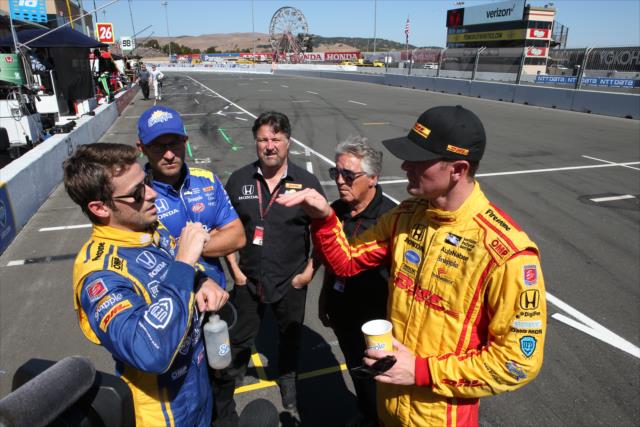 Marco Andretti and Ryan Hunter-Reay chat on pit lane following the final warmup for the GoPro Grand Prix of Sonoma at Sonoma Raceway -- Photo by: Chris Jones