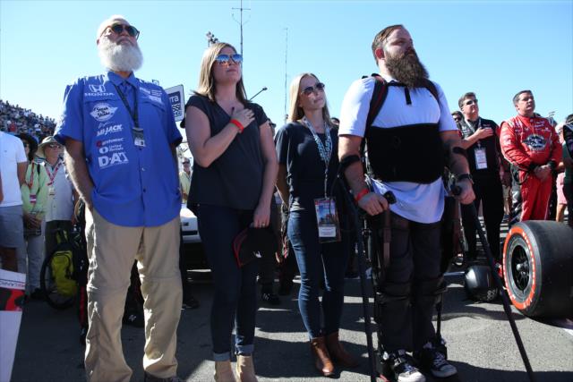 Team co-owner David Letterman stands with veteran Army Sgt. Dan Rose for the National Anthem during pre-race festivities for the GoPro Grand prix of Sonoma -- Photo by: Chris Jones