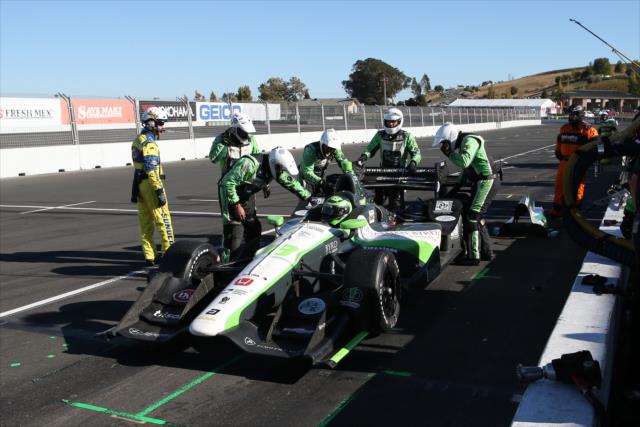 Dale Coyne Racing engineers go to work on the car of Conor Daly on pit lane during the GoPro Grand Prix of Sonoma -- Photo by: Chris Jones