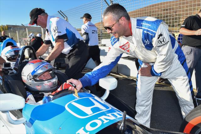 Actor Taylor Kinney thanks Mario Andretti for his two-seater ride around Sonoma Raceway -- Photo by: Chris Owens