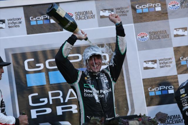 Simon Pagenaud with a champagne shower following his winning the GoPro Grand Prix of Sonoma and the 2016 Verizon IndyCar Series Championship -- Photo by: Joe Skibinski