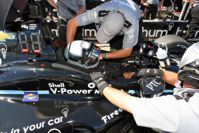 Juan Pablo Montoya gets strapped into his No. 2 Verizon Hum Chevrolet prior to the final warmup for the GoPro Grand Prix of Sonoma at Sonoma Raceway -- Photo by: Richard Dowdy