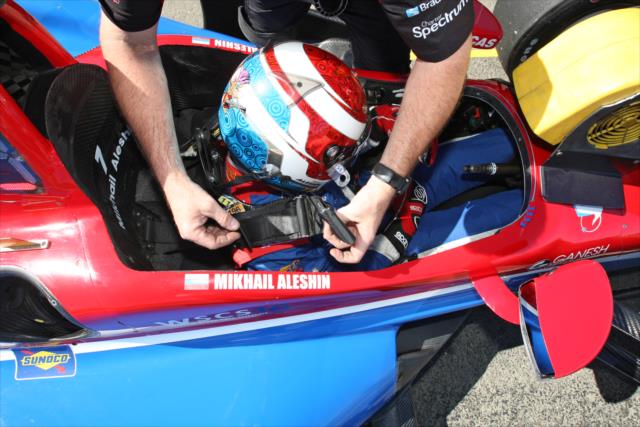 Mikhail Aleshin gets strapped into his No. 7 SMP Racing Honda prior to the final warmup for the GoPro Grand Prix of Sonoma at Sonoma Raceway -- Photo by: Richard Dowdy