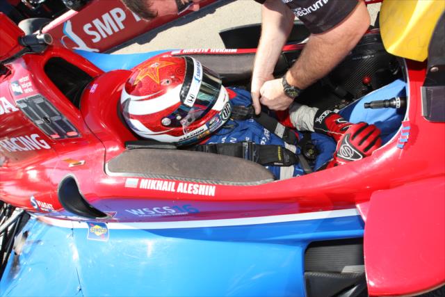 Mikhail Aleshin gets strapped into his No. 7 SMP Racing Honda prior to the final warmup for the GoPro Grand Prix of Sonoma at Sonoma Raceway -- Photo by: Richard Dowdy