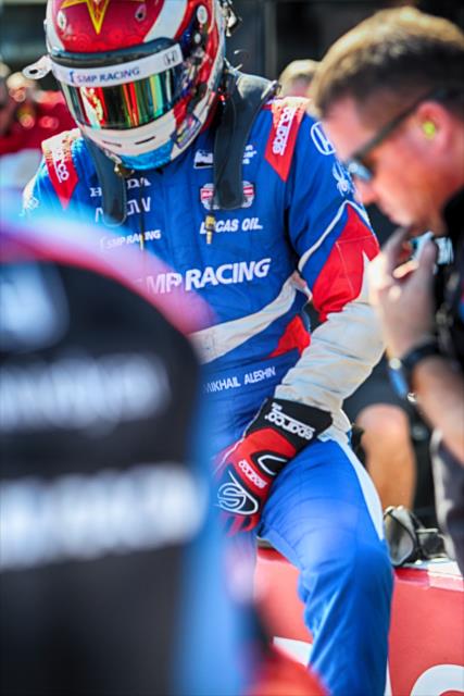 Mikhail Aleshin sits along pit lane prior to the final warmup for the GoPro Grand Prix of Sonoma at Sonoma Raceway -- Photo by: Richard Dowdy