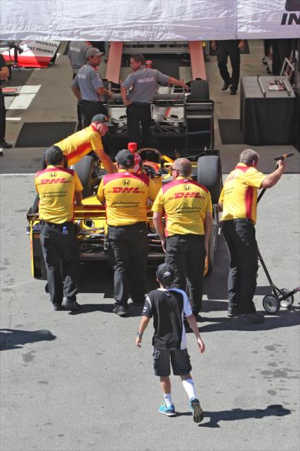 Andretti Autosport crewmen wheel the No. 28 DHL Honda of Ryan Hunter-Reay to technical inspection prior to the GoPro Grand Prix of Sonoma -- Photo by: Richard Dowdy