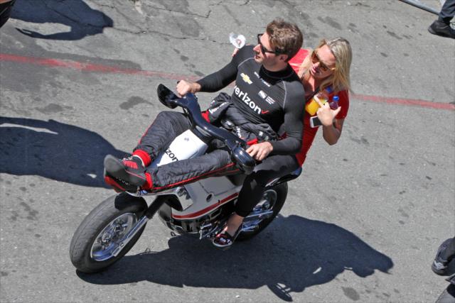 Will Power and his wife, Liz, ride back to the Sonoma Raceway paddock following the final warmup for the GoPro Grand Prix of Sonoma -- Photo by: Richard Dowdy