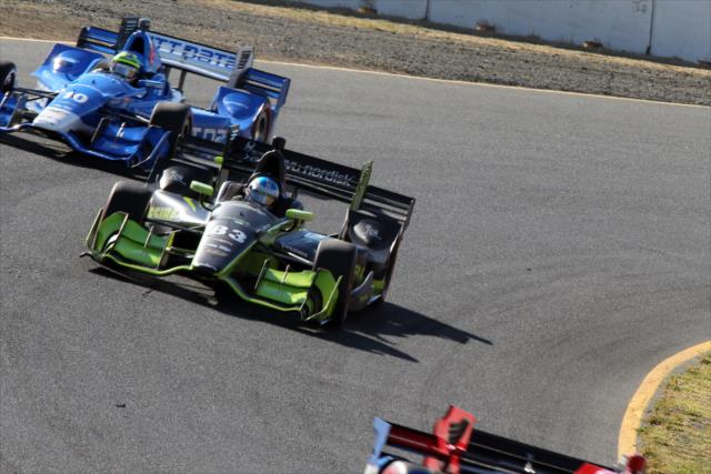 Charlie Kimball and Tony Kanaan roll into the Turn 6 Carousel during the GoPro Grand Prix of Sonoma -- Photo by: Richard Dowdy