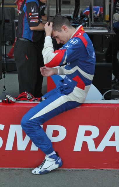 Mikhail Aleshin takes a quiet moment on pit lane following the GoPro Grand Prix of Sonoma -- Photo by: Richard Dowdy