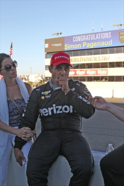 An exhausted Juan Pablo Montoya sits on pit lane following the conclusion of the GoPro Grand Prix of Sonoma -- Photo by: Richard Dowdy