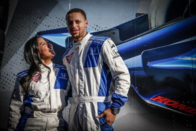 Grand Marshal Ayesha Curry and her husband, NBA All-Star Steph Curry, prior to the two-seater ride around Sonoma Raceway -- Photo by: Shawn Gritzmacher