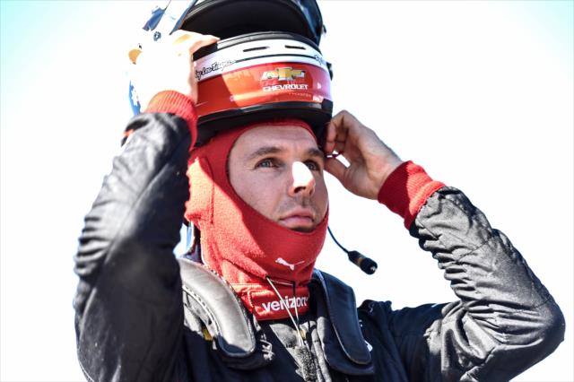 Will Power slides on his helmet prior to the start of the GoPro Grand Prix of Sonoma -- Photo by: Chris Owens