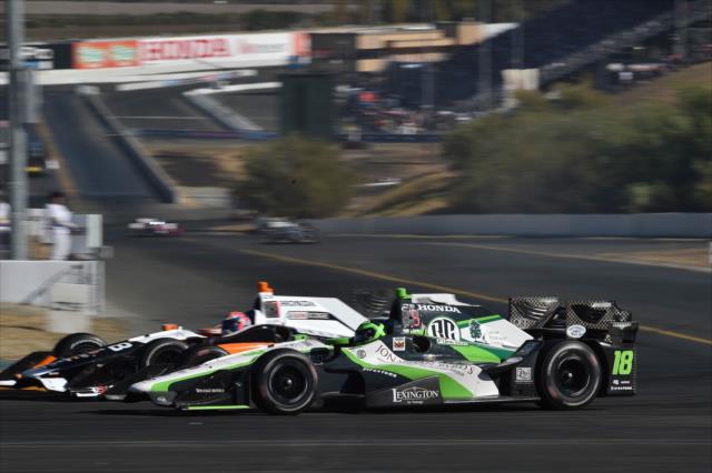 Alexander Rossi and Conor Daly go wheel-to-wheel in the Turn 7 Hairpin during the GoPro Grand Prix of Sonoma -- Photo by: Chris Owens