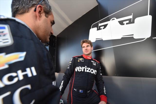 Teammates Will Power and Juan Pablo Montoya chat backstage during pre-race festivities for the GoPro Grand Prix of Sonoma -- Photo by: Chris Owens