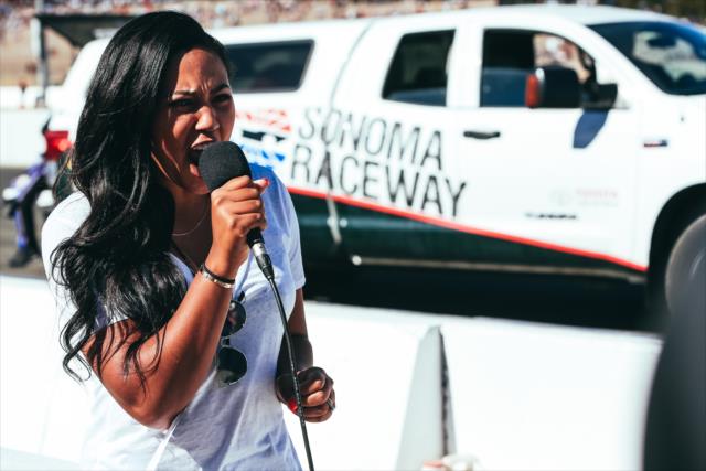 Grand Marshal Ayesha Curry gives the command to start engines during pre-race festivities for the GoPro Grand Prix of Sonoma -- Photo by: Joe Skibinski