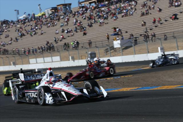 Helio Castroneves leads a group through the Turn 9-9A Esses during the GoPro Grand Prix of Sonoma -- Photo by: Joe Skibinski