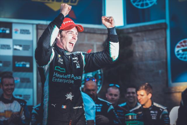 Simon Pagenaud begins the celebration in Victory Lane following his win in the GoPro Grand Prix of Sonoma to become the 2016 Verizon IndyCar Series Champion -- Photo by: Joe Skibinski