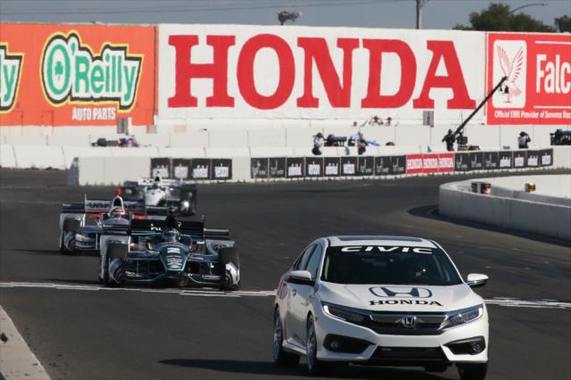The Honda Civic pace car leads Josef Newgarden and the rest of the field across the frontstretch prior to the start of the GoPro Grand Prix of Sonoma -- Photo by: Chris Jones