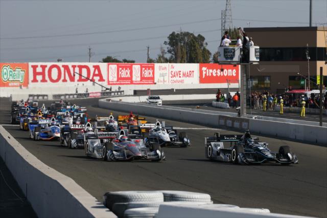 Josef Newgarden and Will Power lead the field into Turn 1 to start the GoPro Grand Prix of Sonoma at Sonoma Raceway -- Photo by: Chris Jones