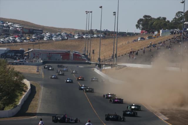 The field streams up the hill toward Turn 7 during the start of the GoPro Grand Prix of Sonoma at Sonoma Raceway -- Photo by: Chris Jones