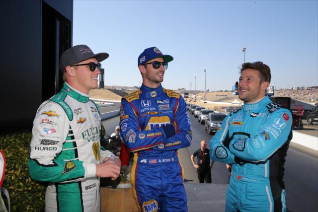 Spencer Pigot, Alexander Rossi, and Marco Andretti chat backstage during pre-race introductions for the GoPro Grand Prix of Sonoma -- Photo by: Chris Jones