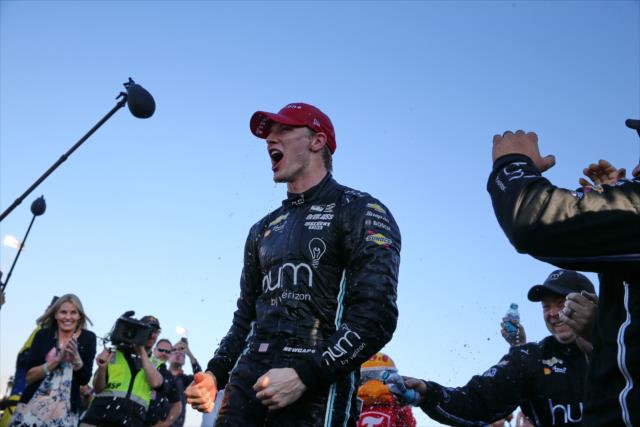 Josef Newgarden begins the celebration on pit lane after winning the 2017 Verizon IndyCar Series championship -- Photo by: Chris Jones