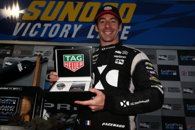 Simon Pagenaud with his TAG Heuer winner's watch in Victory Lane after winning the 2017 GoPro Grand Prix of Sonoma at Sonoma Raceway -- Photo by: Chris Jones