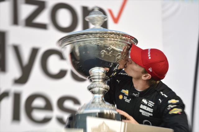 Josef Newgarden kisses the Astor Cup as the 2017 Verizon IndyCar Series Champion at Sonoma Raceway -- Photo by: Chris Owens