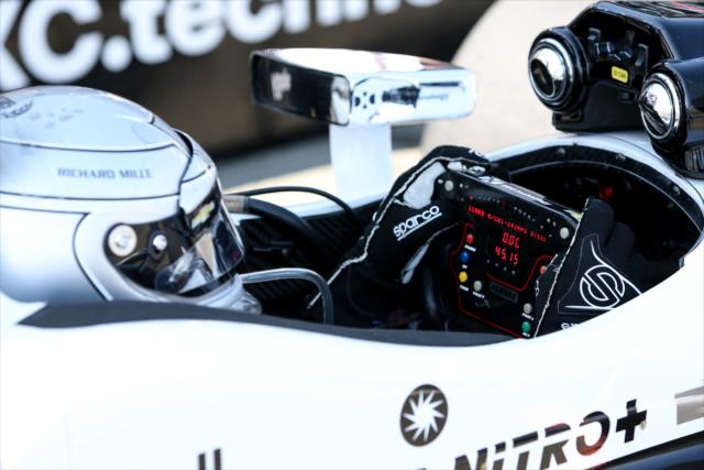Simon Pagenaud pages through his steering wheel data on pit lane during the final warmup for the GoPro Grand Prix of Sonoma at Sonoma Raceway -- Photo by: Joe Skibinski