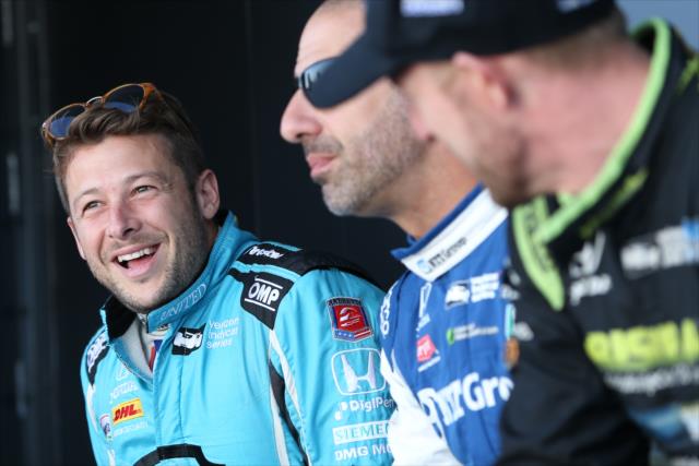 Marco Andretti, Tony Kanaan, and Charlie Kimball chat backstage during pre-race festivities for the GoPro Grand Prix of Sonoma at Sonoma Raceway -- Photo by: Joe Skibinski