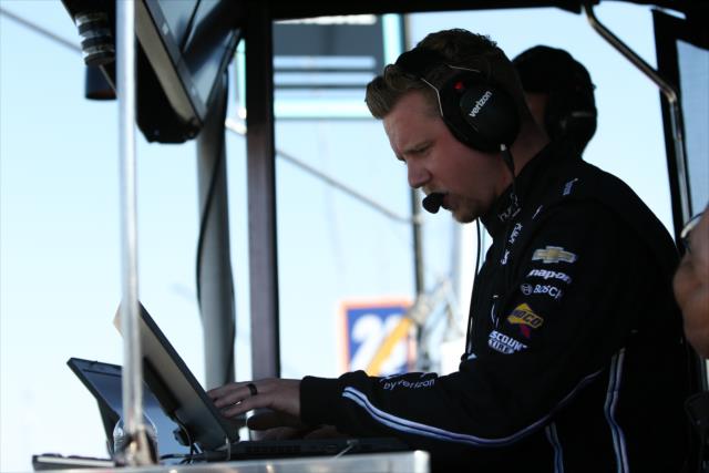 A Team Penske engineer looks over data during the GoPro Grand Prix of Sonoma at Sonoma Raceway -- Photo by: Joe Skibinski