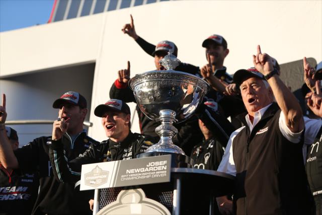 Josef Newgarden, Roger Penske, and Team Penske celebrate after winning the 2017 Verizon IndyCar Series championship -- Photo by: Joe Skibinski