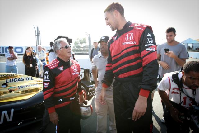 Golden State Warriors star Klay Thompson chats with Mario Andretti prior to his two-seater ride around Sonoma Raceway -- Photo by: Joe Skibinski