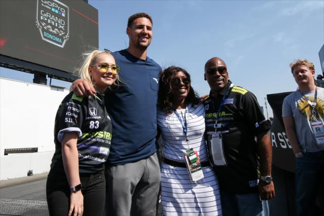 Klay Thompson and RaeLynn pose for a photograph during pre-race festivities for the GoPro Grand Prix of Sonoma at Sonoma Raceway -- Photo by: Joe Skibinski