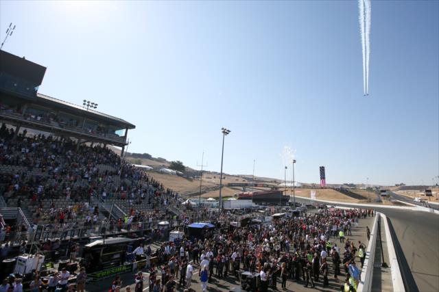 Pit lane comes to life during pre-race festivities for the GoPro Grand Prix of Sonoma -- Photo by: Joe Skibinski
