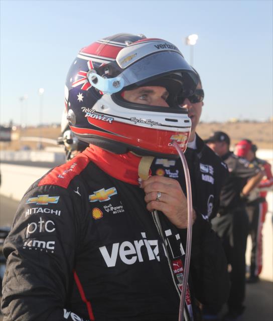 Will Power begins to unfasten his helmet on pit lane following the GoPro Grand Prix of Sonoma -- Photo by: Richard Dowdy
