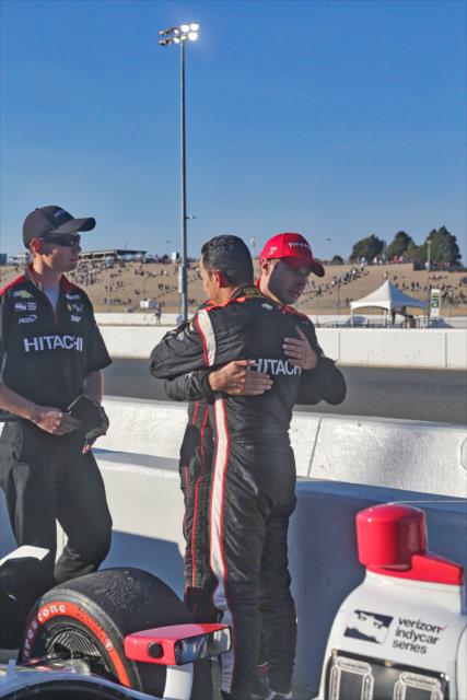 Will Power hugs Helio Castroneves along pit lane after the GoPro Grand Prix of Sonoma at Sonoma Raceway -- Photo by: Richard Dowdy