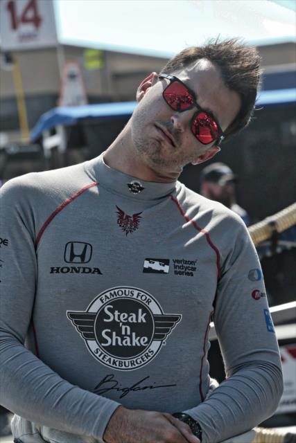 Graham Rahal stretches out on pit lane prior to the final warmup for the GoPro Grand Prix of Sonoma at Sonoma Raceway -- Photo by: Richard Dowdy