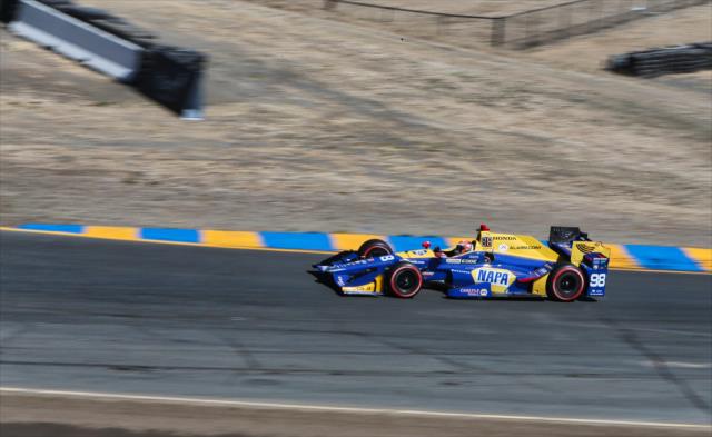 Alexander Rossi hits the apex of Turn 2 during the final warmup for the GoPro Grand Prix of Sonoma -- Photo by: Richard Dowdy
