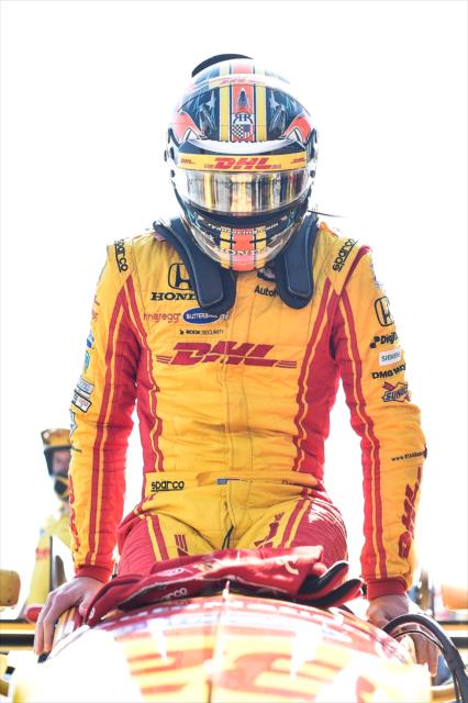 Ryan Hunter-Reay slides out of his No. 28 DHL Honda on pit lane following the GoPro Grand Prix of Sonoma -- Photo by: Chris Owens
