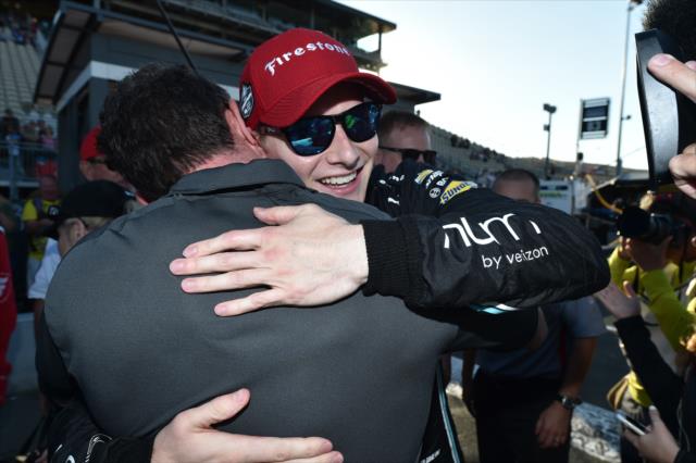 Josef Newgarden gets a hug along pit lane after winning the 2017 Verizon IndyCar Series championship -- Photo by: Chris Owens