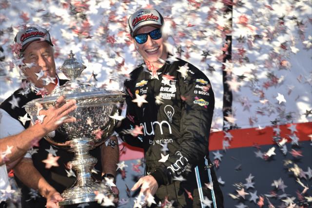 Josef Newgarden and Roger Penske with the Astor Cup as the 2017 Verizon IndyCar Series champion -- Photo by: Chris Owens