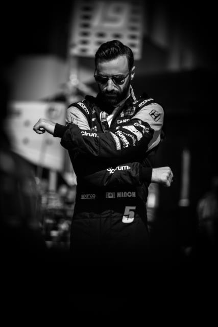 James Hinchcliffe gets stretched out along pit lane prior to the GoPro Grand Prix of Sonoma -- Photo by: Shawn Gritzmacher
