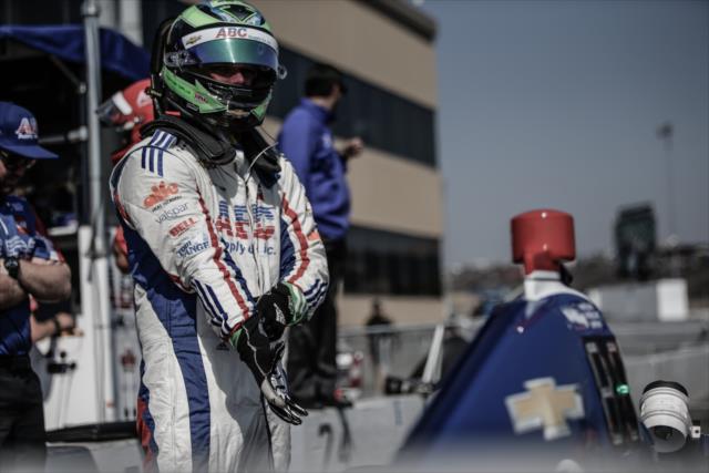 Conor Daly tightens his gloves on pit lane prior to the final warmup for the GoPro Grand Prix of Sonoma -- Photo by: Shawn Gritzmacher